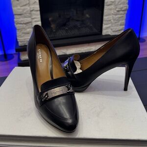 Coach Garden black Semi Matte Calf pumps with silver-tone chain detail. Size 7
